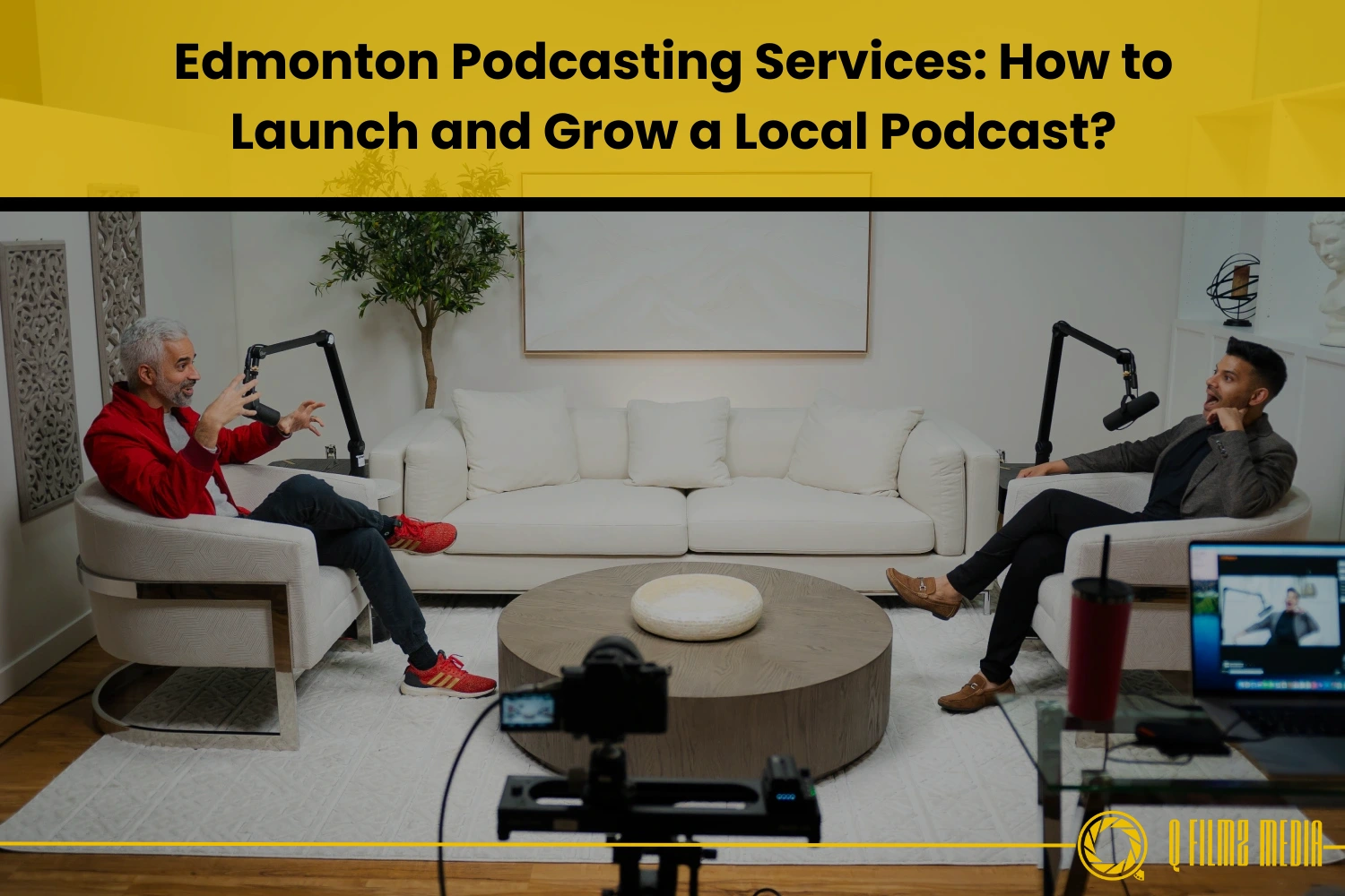 Interview recording of two men podcasting in a modern living room with microphone equipment and camera setup for Edmonton podcasting services.